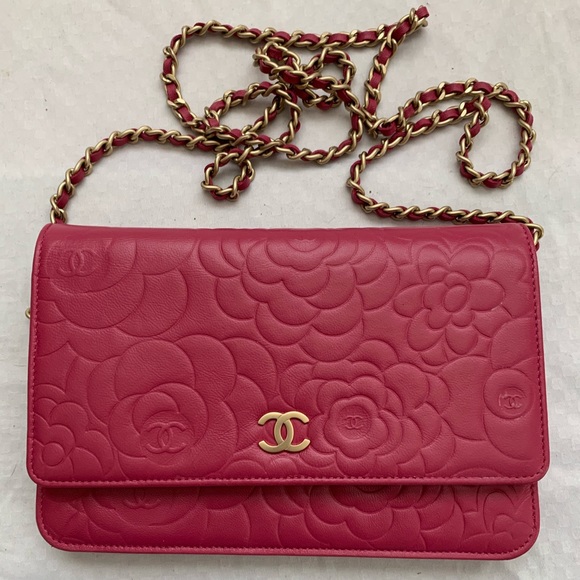 CHANEL Handbags - CHANEL pink WOC with floral pattern